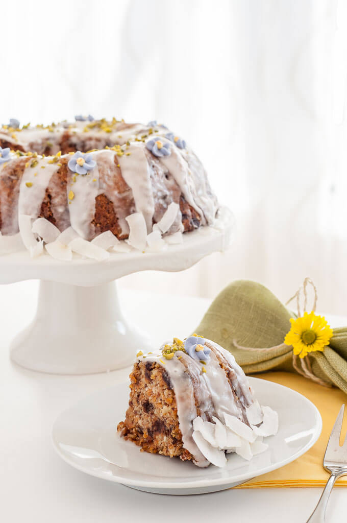 Gluten-free Vegan Carrot Cake Recipe with Icing #Easter #nuts #chocolate chips