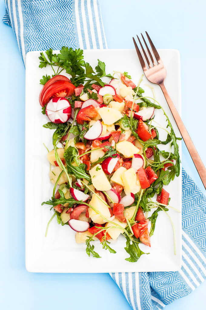 Healthy Vegetable Potato Salad Recipe w/ Bell peppers, tomatoes, radishes, arugula and more! No mayo ;) - VeganFamilyRecipes.com - #vegetables #potatoes
