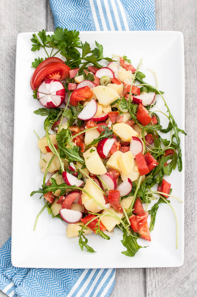 Healthy Vegetable Potato Salad Recipe w/ Bell peppers, tomatoes, radishes, arugula and more! No mayo ;) - VeganFamilyRecipes.com - #vegetables #potatoes